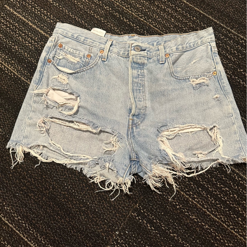 Distressed Light Blue Levi’s